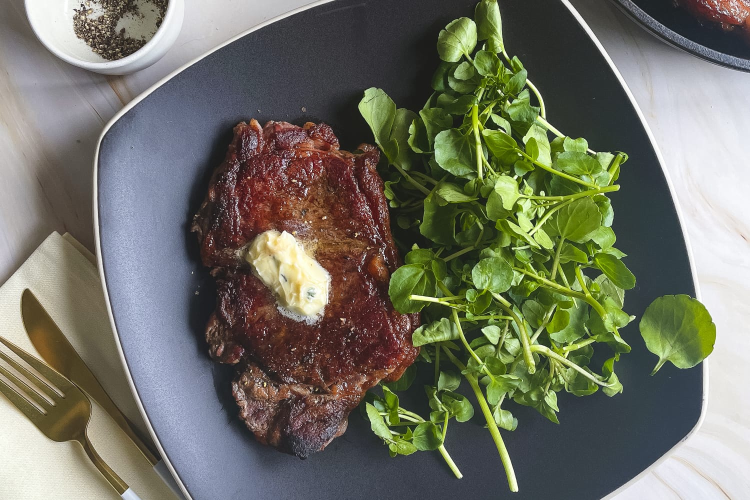 Strip Steak Recipe Pan Seared With Herby Butter The Kitchn 